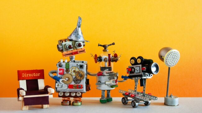 cropped-motion-picture-robotic-filmmaking-backstage-concept-robot-director-and-cameraman-shoots-blockbuster.jpg
